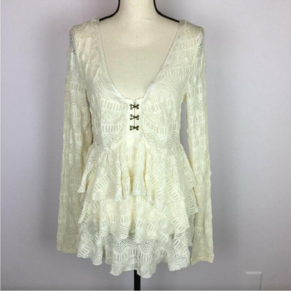 White blouse with tiered ruffles